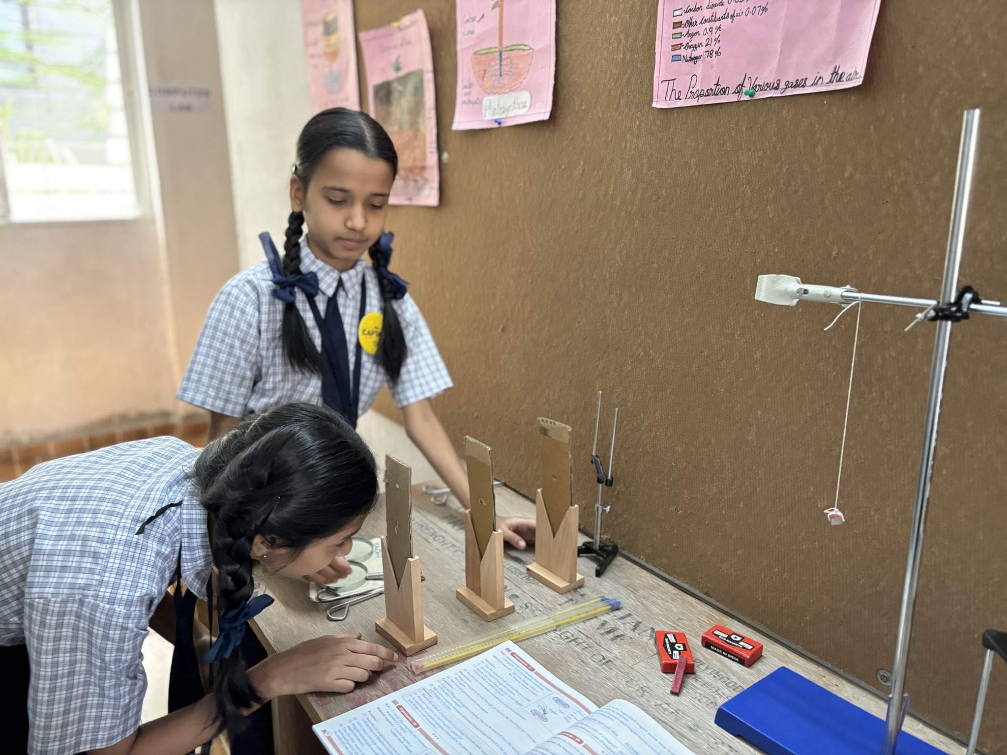 WonderKids Academy students doing a science activity